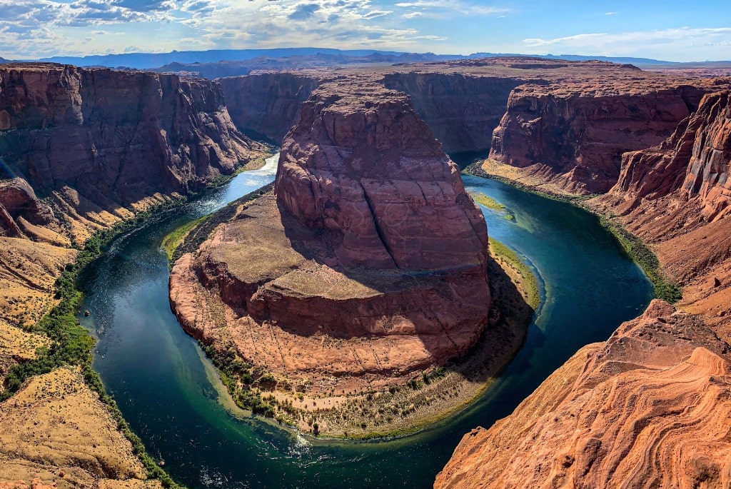 “Tourist walking along South Rim trail in Grand Canyon”